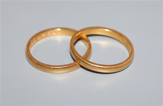 Two 22ct gold wedding bands.